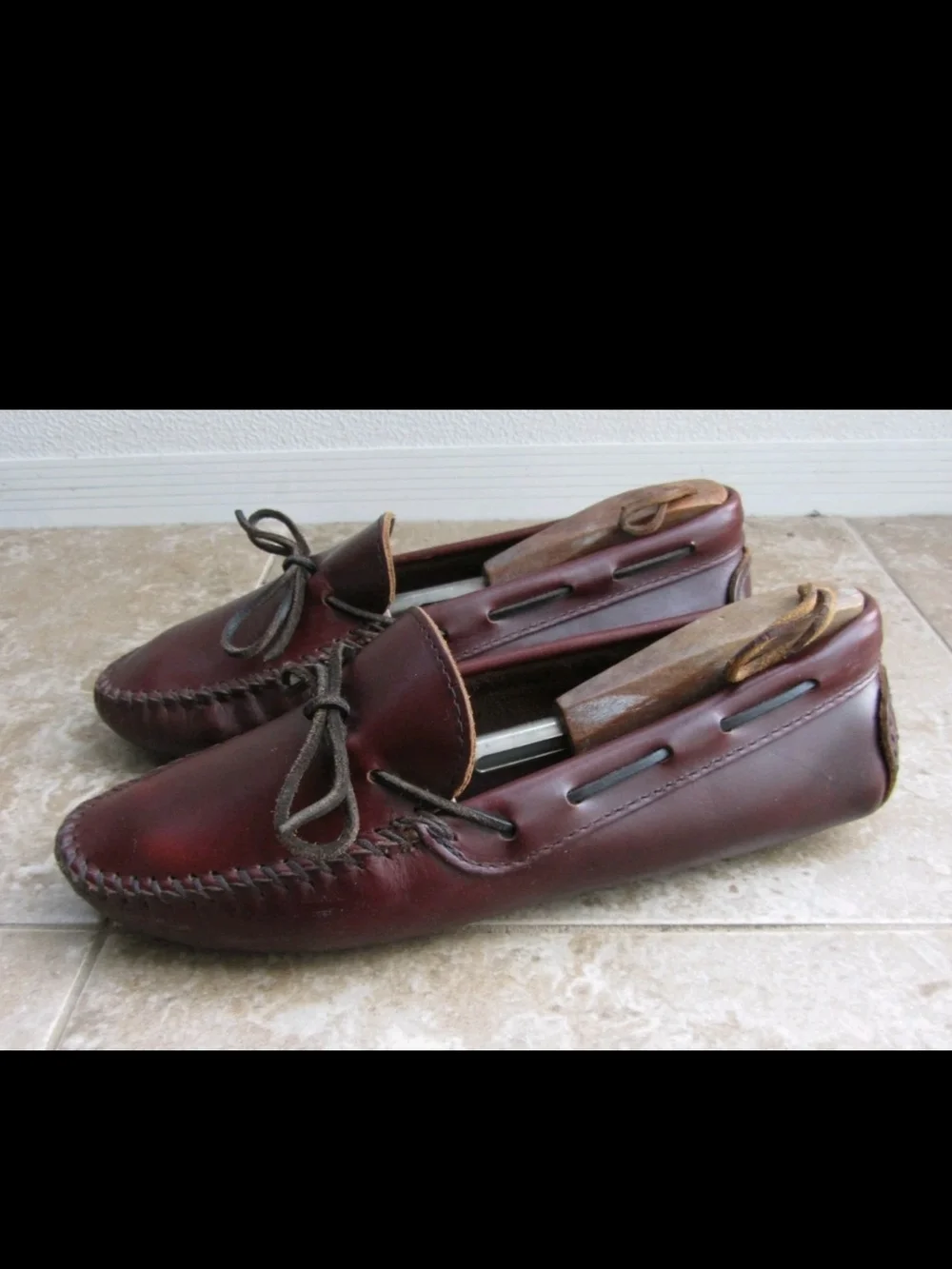 Minnetonka Men's Burgundy Leather Moc Toe Slip-Ons